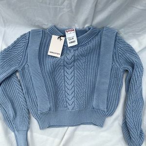 Blue sweater with tags